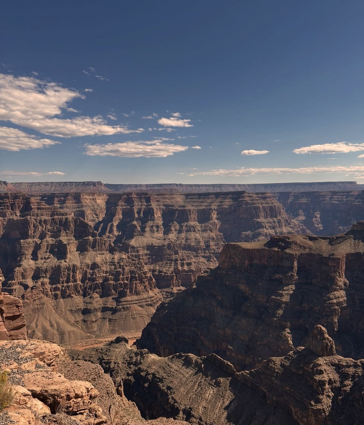 Layered cliffs and side canyons of the Grand Canyon seen from the rim